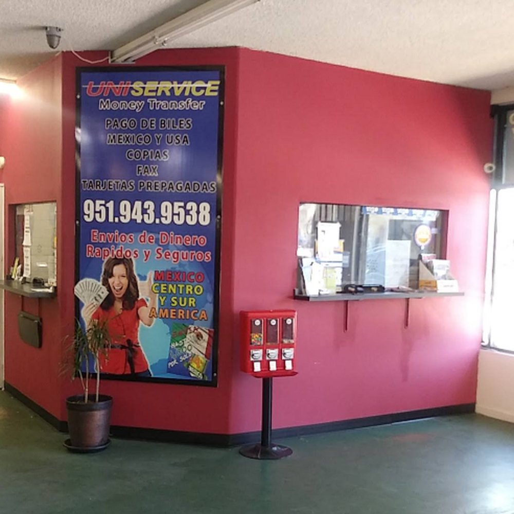 Uni-Service Money Transfers storefront sign at 334 S D St, Perris, CA - top-rated local money transfer service